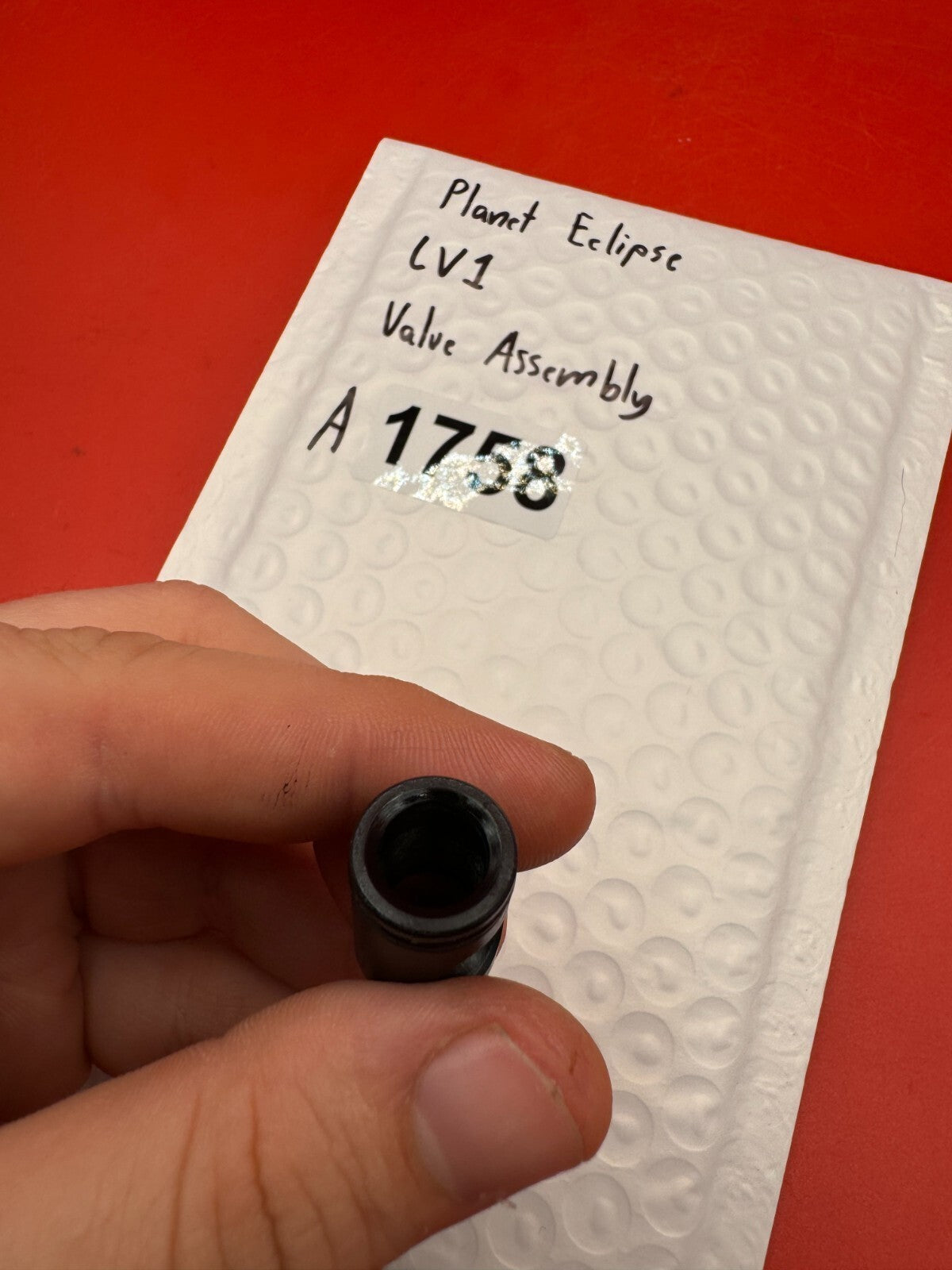 Planet Eclipse LV1 Valve Assembly - used paintball valve assembly - black/silver