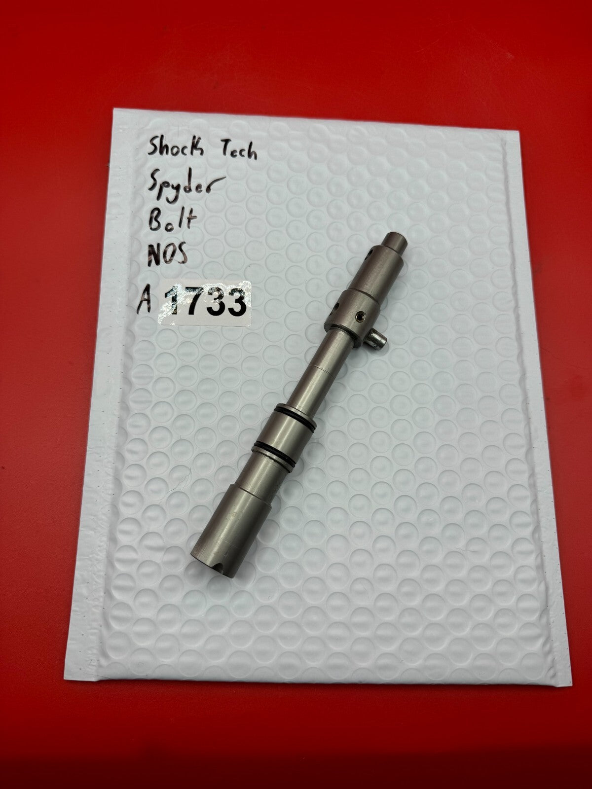 Shock Tech Spyder Bolt NOS - used paintball bolt - silver