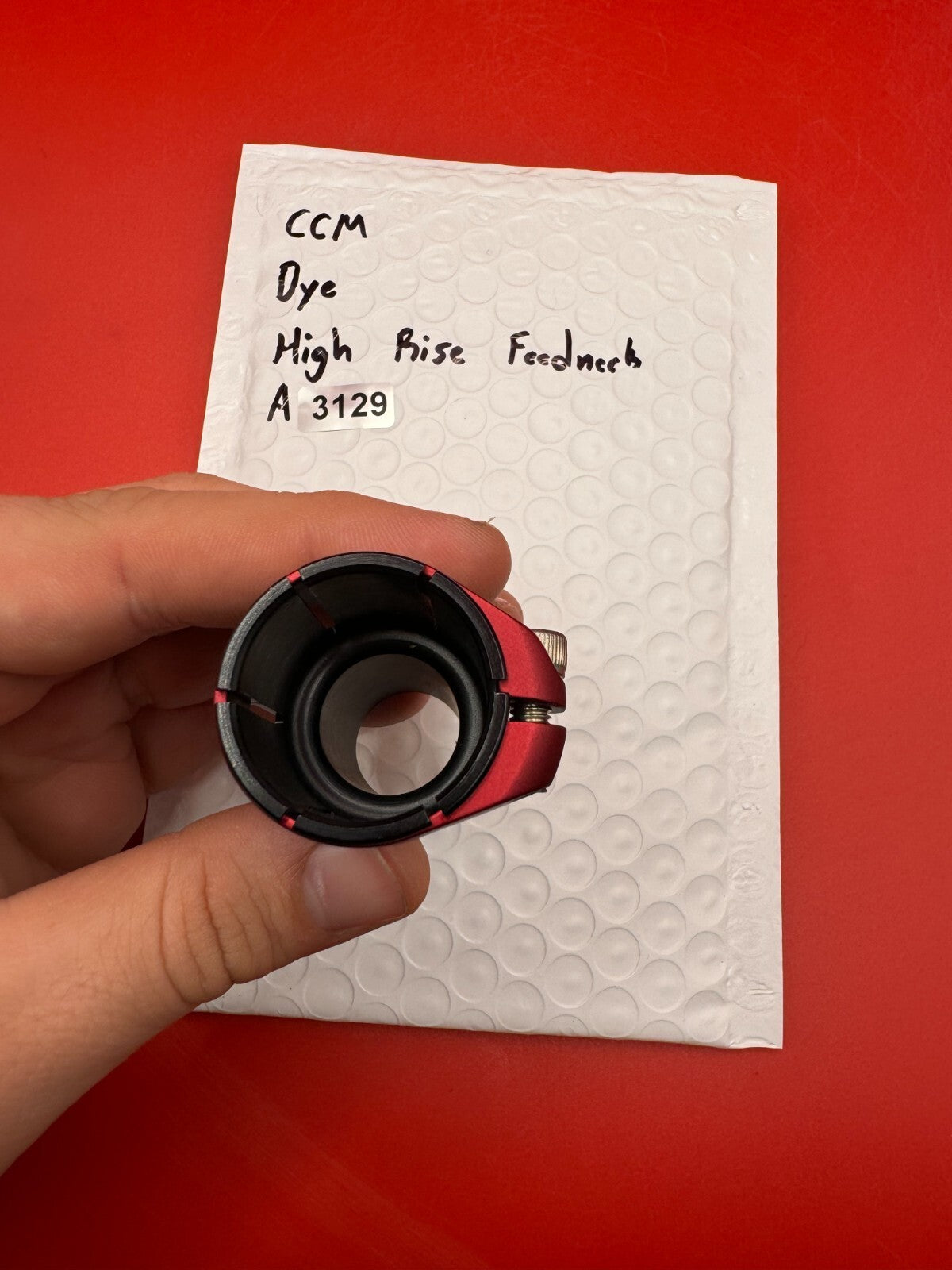 CCM Dye High Rise Feedneck - used paintball feedneck - black/red anno
