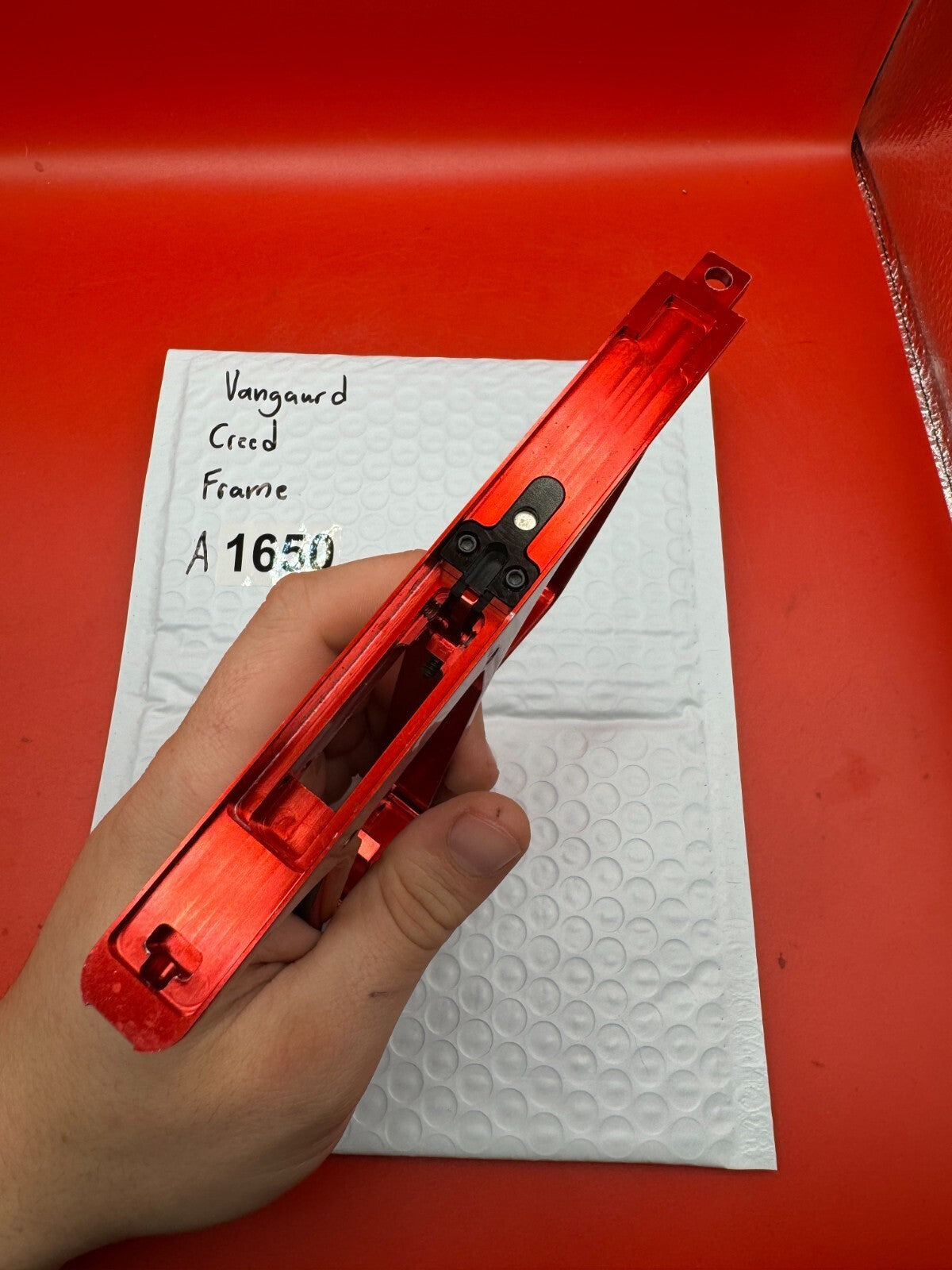 Vangaurd Creed Paintball Marker Frame - used paintball trigger frame - red anno