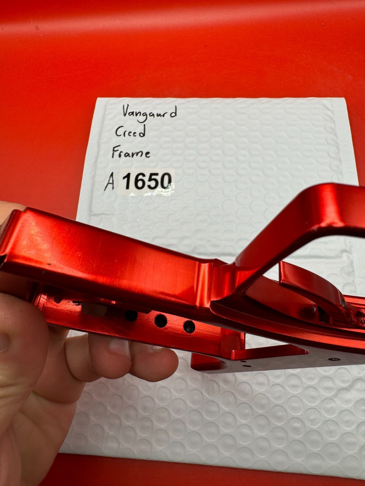 Vangaurd Creed Paintball Marker Frame - used paintball trigger frame - red anno