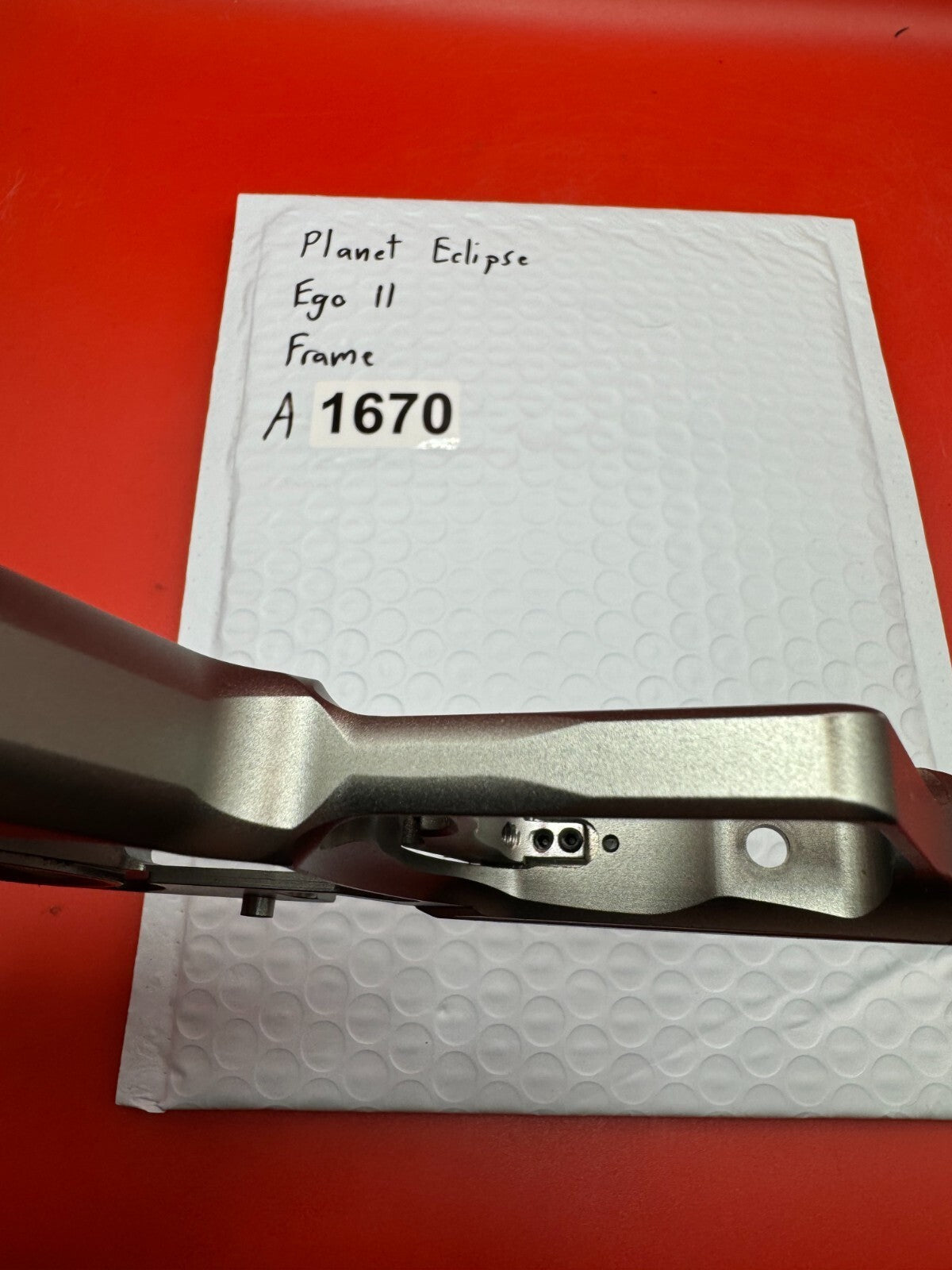 Planet Eclipse Ego II Paintball Marker Frame - used paintball trigger frame - silver/raw aluminum