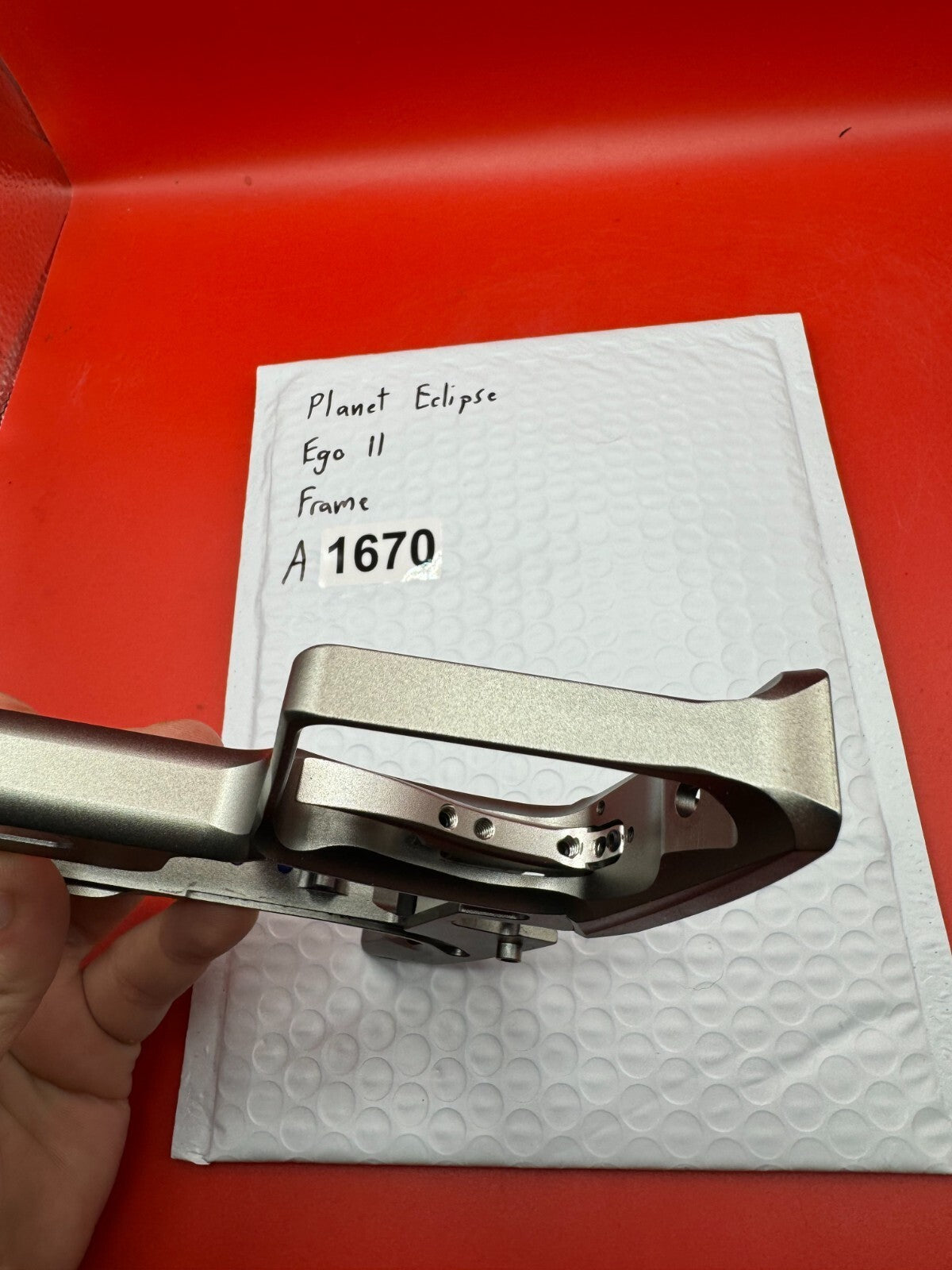 Planet Eclipse Ego II Paintball Marker Frame - used paintball trigger frame - silver/raw aluminum