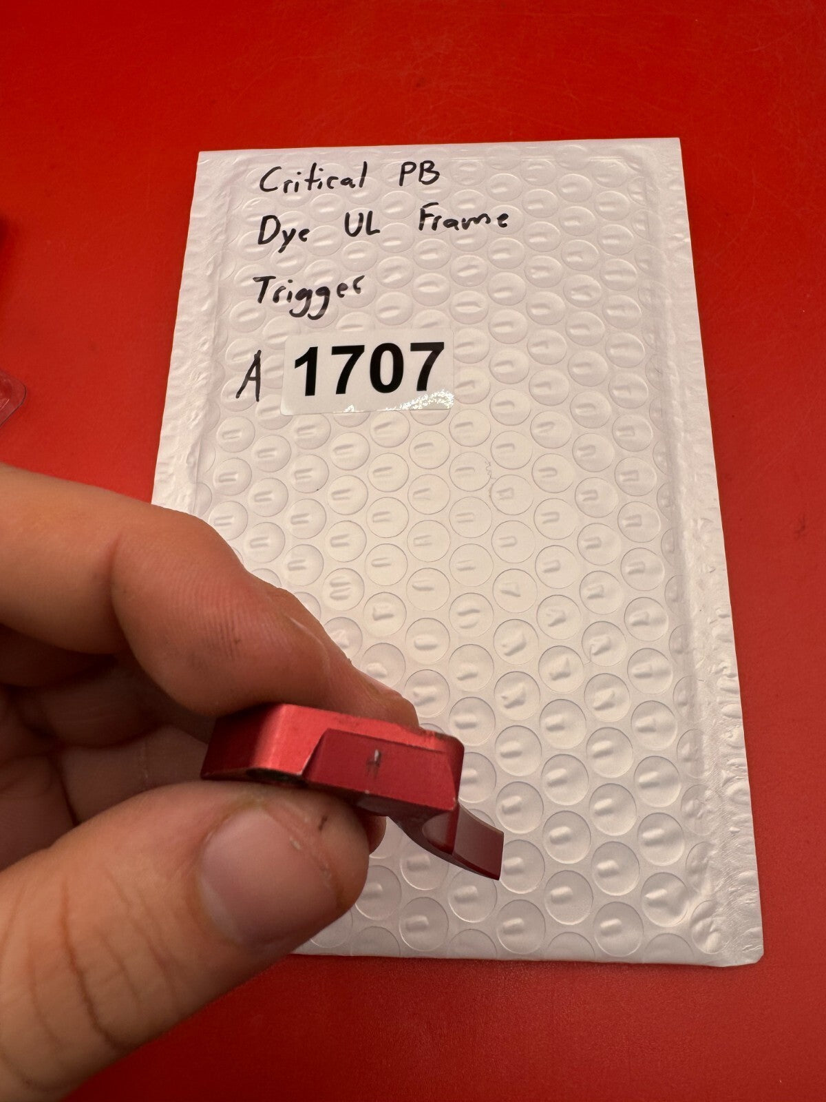 Critical PB Dye UL Frame Trigger - used paintball trigger - red anno