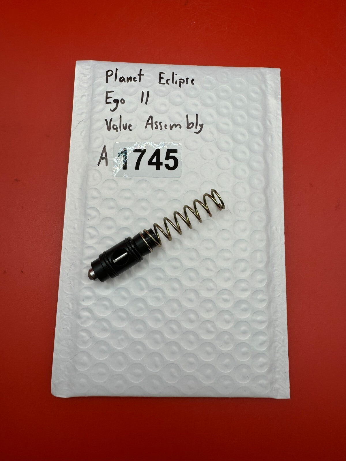 Planet Eclipse Ego II Valve Assembly - used paintball valve assembly - black