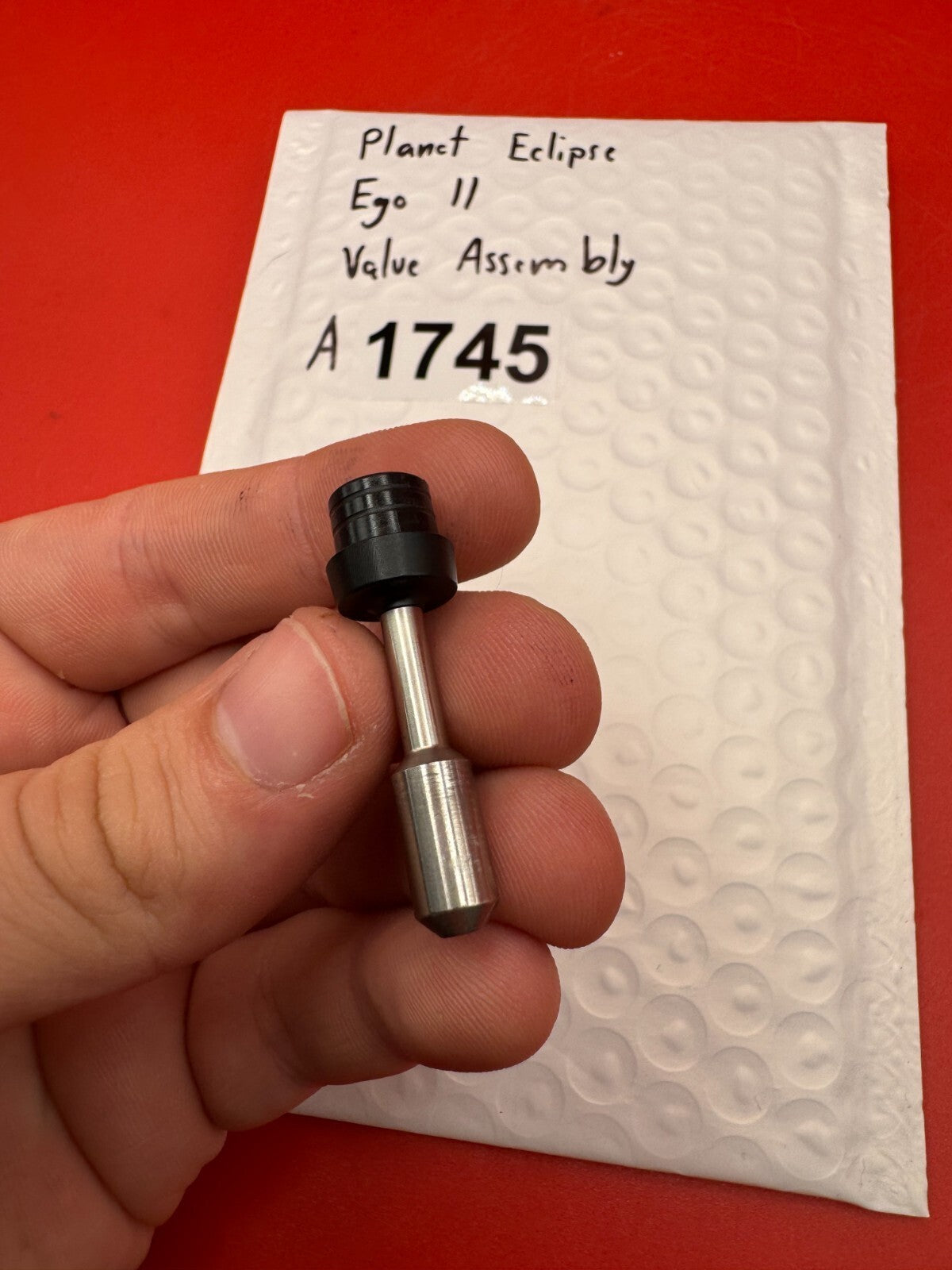 Planet Eclipse Ego II Valve Assembly - used paintball valve assembly - black