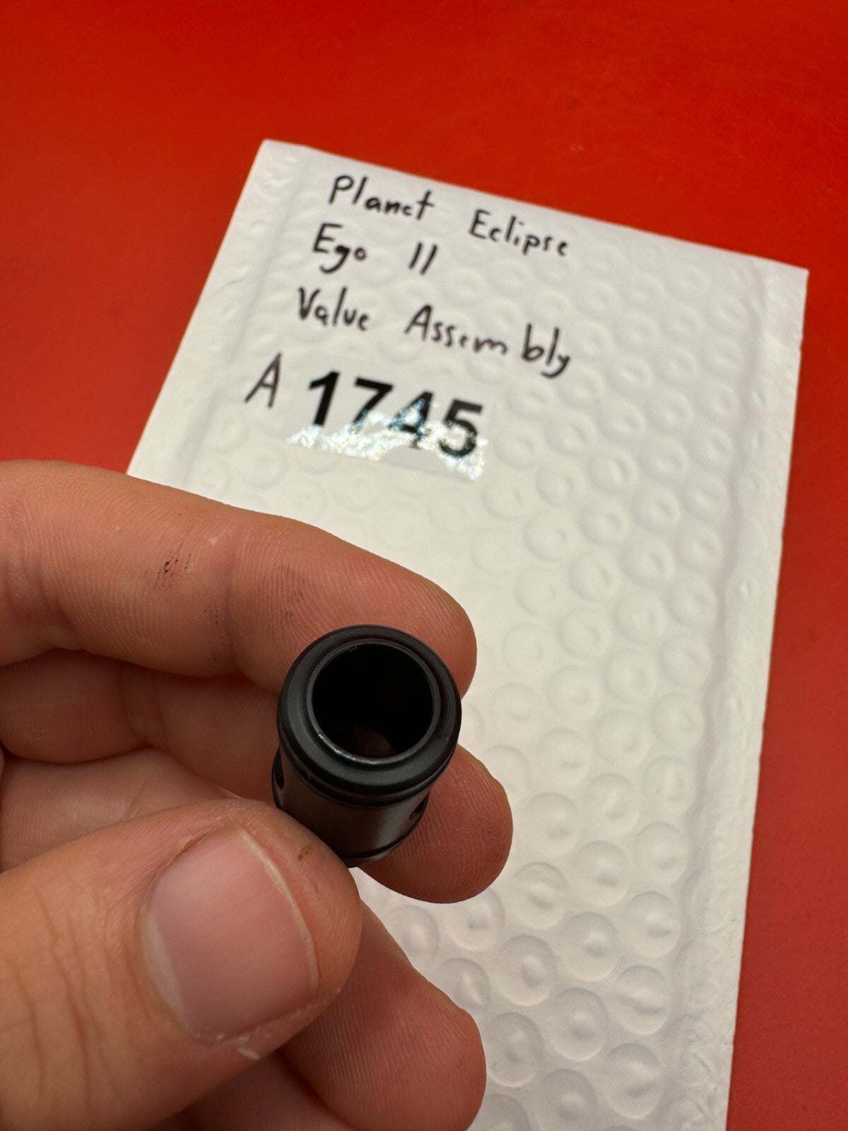 Planet Eclipse Ego II Valve Assembly - used paintball valve assembly - black