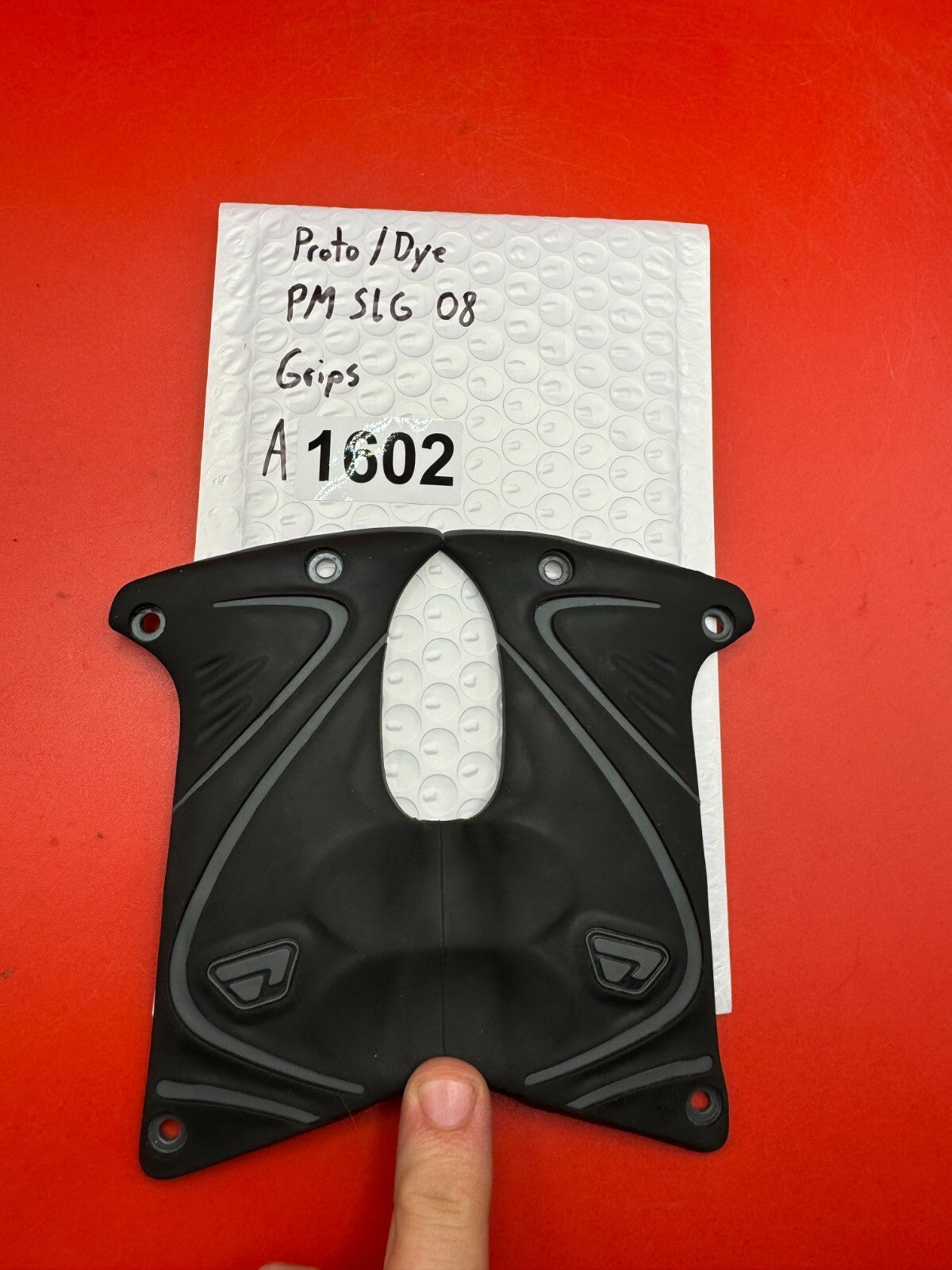 Proto/Dye PM SLG 08 Grips - used paintball grips - black/gray