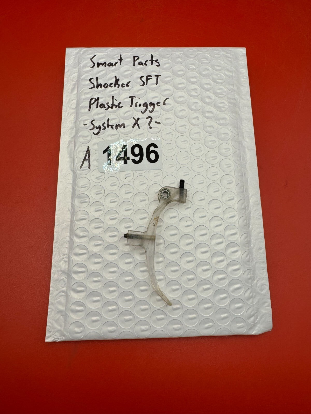 Smart Parts Shocker SFT Plastic Trigger -System X?- - used paintball trigger - clear/translucent