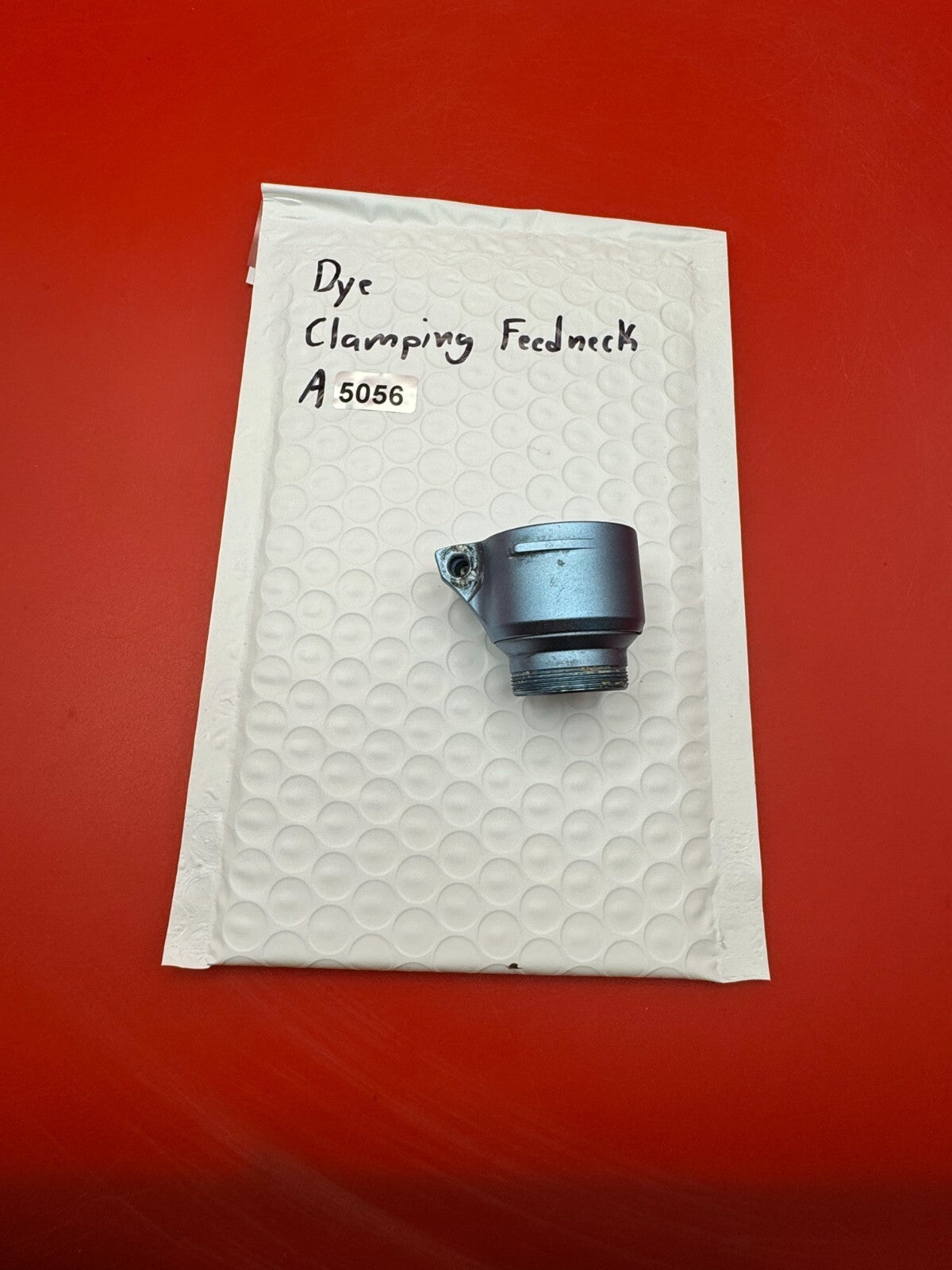 Dye Clamping Feedneck