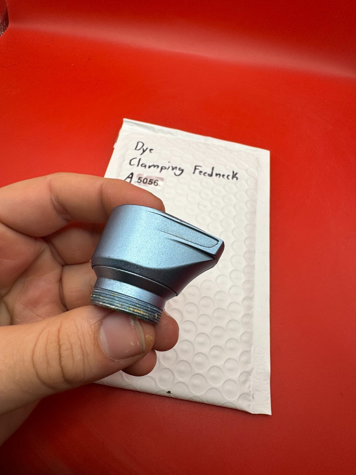Dye Clamping Feedneck