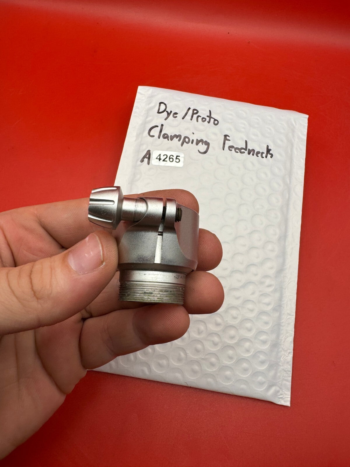 Dye/Proto Clamping Feedneck