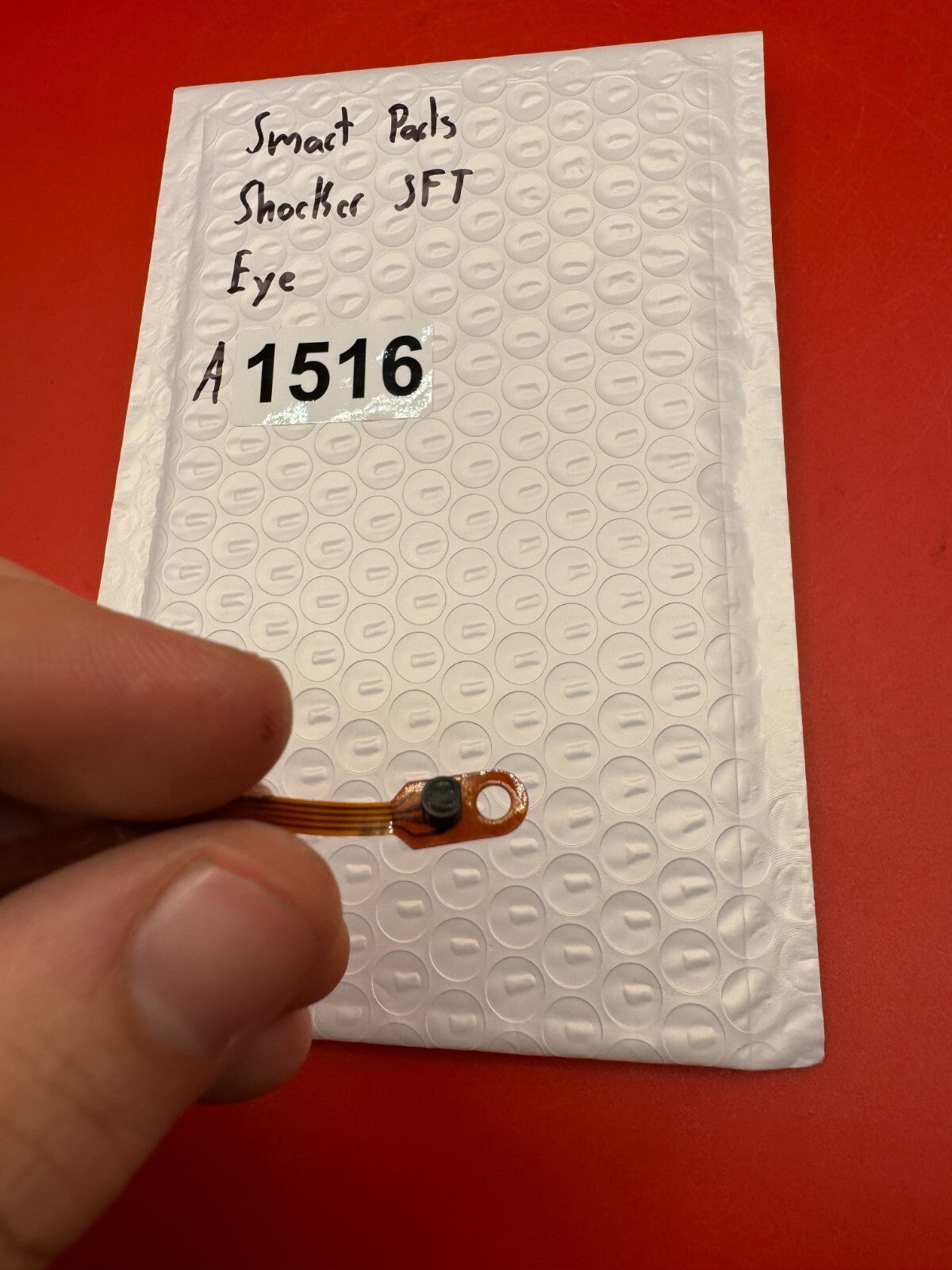 Smart Parts Shocker SFT Eye - used paintball eye (ball detent sensor / flex cable assembly) - copper/amber
