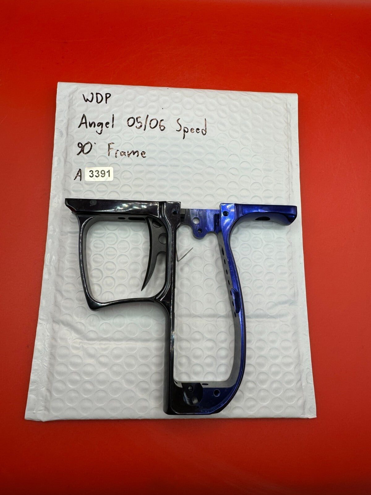 WDP Angel 05/06 Speed 90° Frame - used paintball trigger frame - black/blue fade