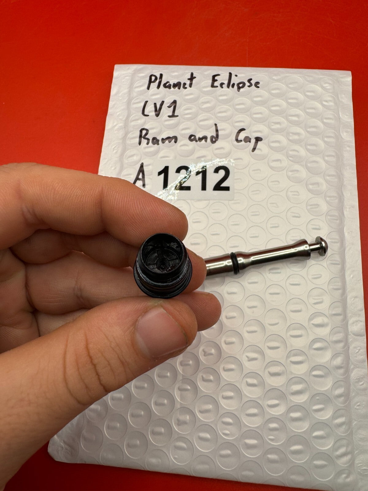 Planet Eclipse LV1 Ram and Cap - used paintball ram and cap - black/silver