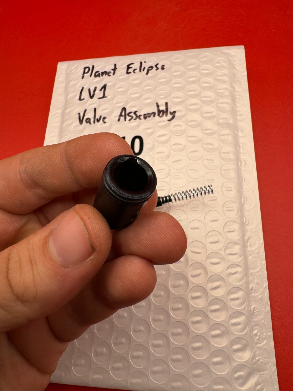 Planet Eclipse LV1 Valve Assembly - used paintball valve assembly - black