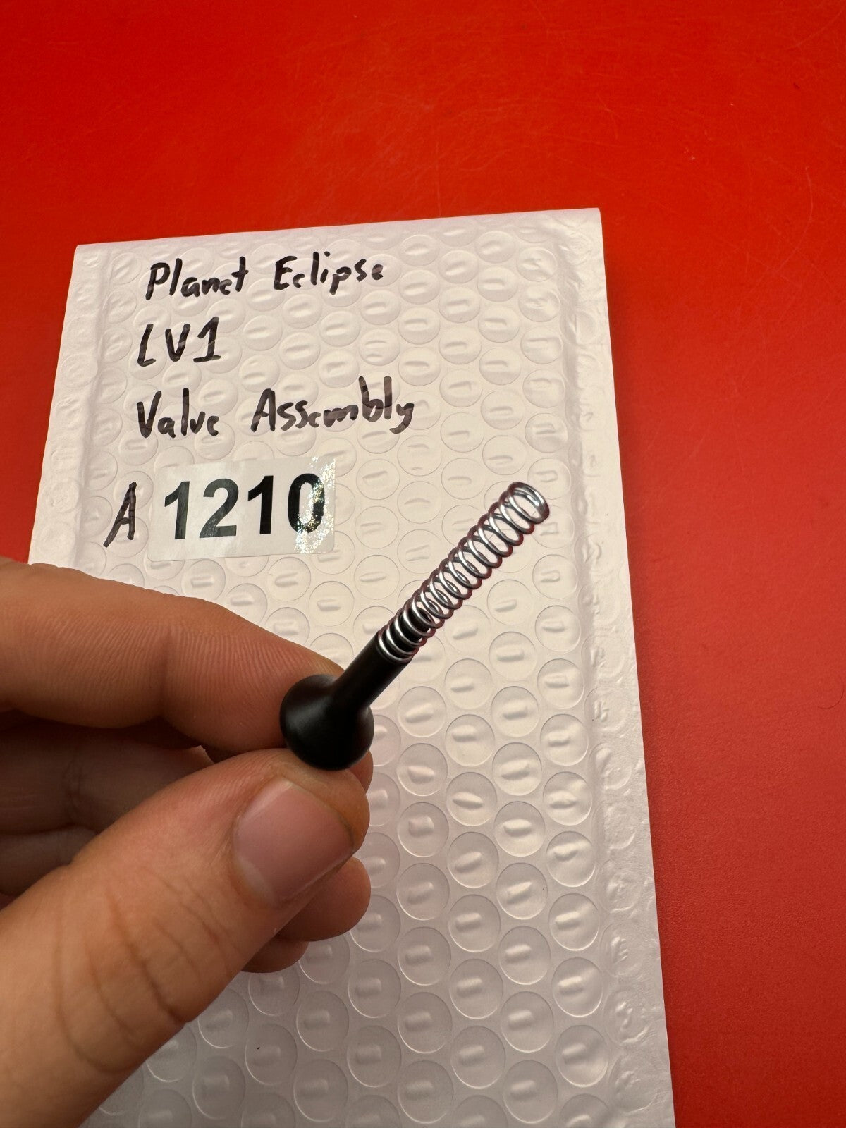 Planet Eclipse LV1 Valve Assembly - used paintball valve assembly - black