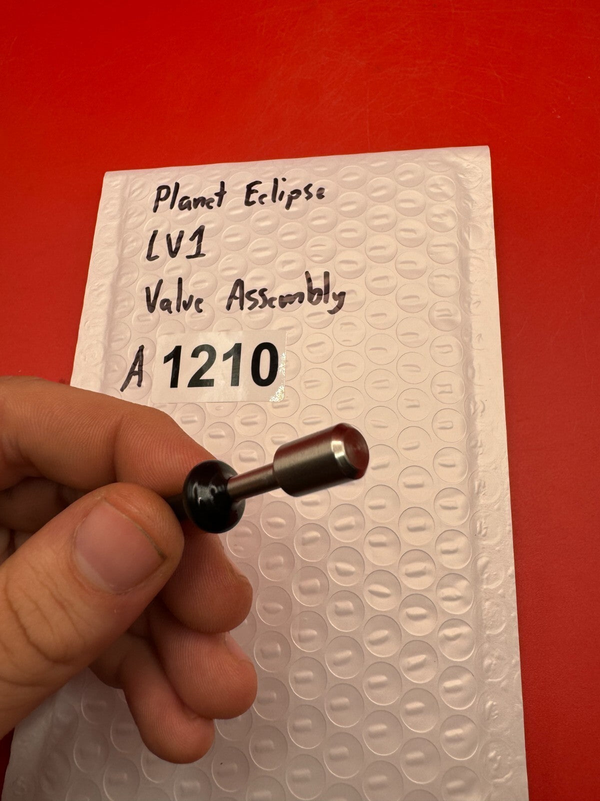 Planet Eclipse LV1 Valve Assembly - used paintball valve assembly - black