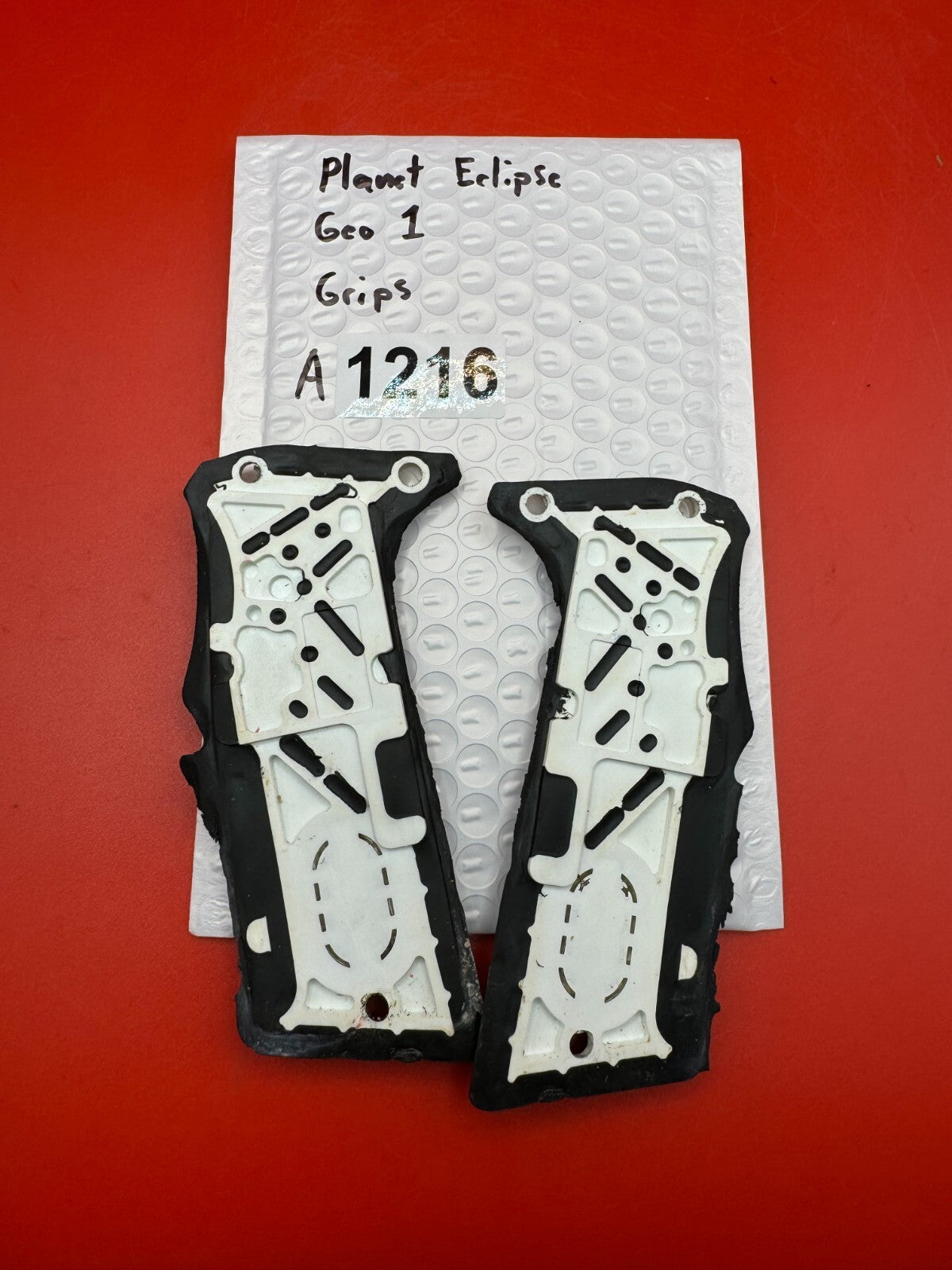 Planet Eclipse Geo 1 Grips - used paintball grip panels - black/white