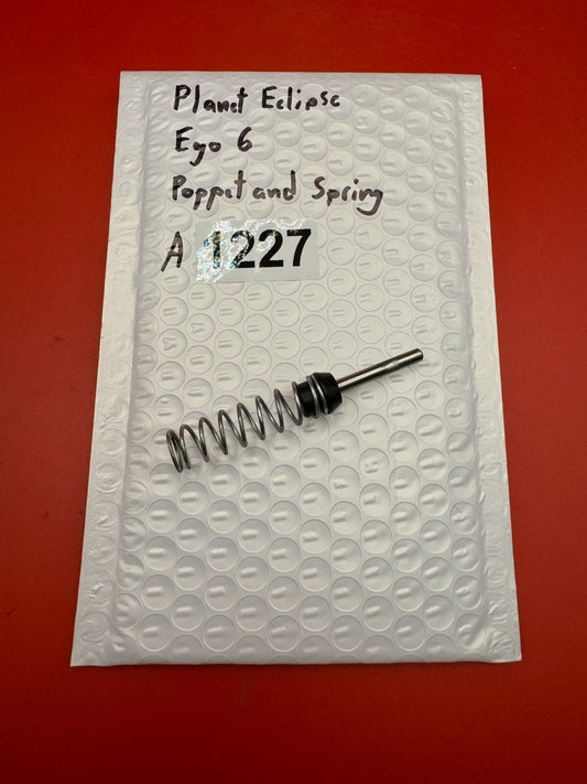 Planet Eclipse Ego 6 Poppet and Spring - used paintball poppet valve and spring - black/silver
