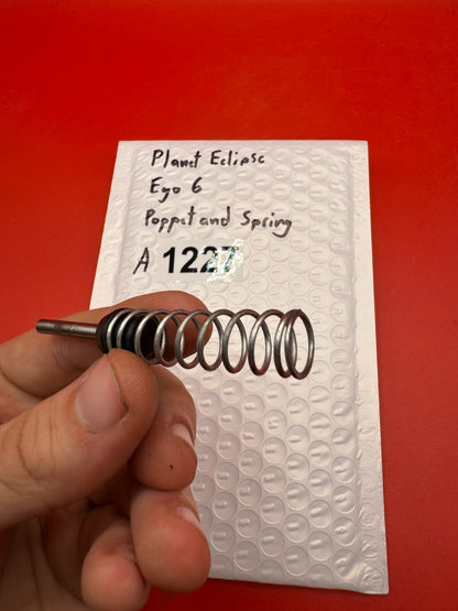 Planet Eclipse Ego 6 Poppet and Spring - used paintball poppet valve and spring - black/silver