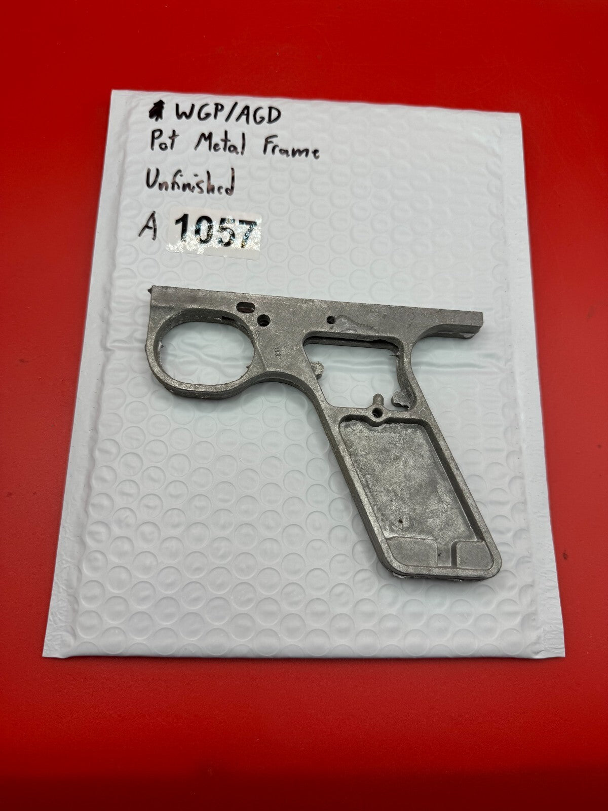 WGP/AGD Pot Metal Frame Unfinished - used paintball grip frame - raw pot metal / unfinished silver-grey