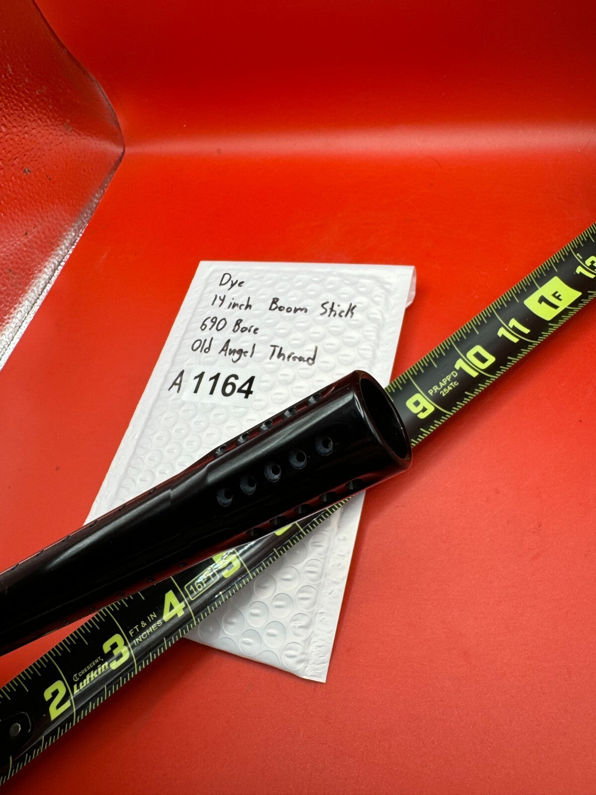Dye 14 inch Boom Stick 690 Bore Old Angel Thread - used paintball barrel (two-piece: back + tip) - black anodized barrel tube with red/pink anno back, polished silver chrome mid-section coupler