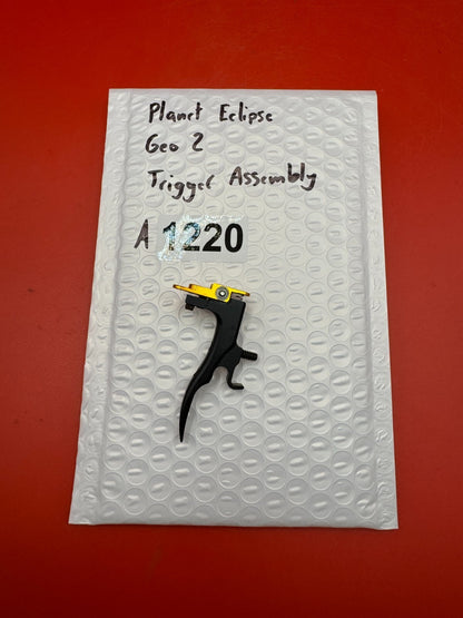 Planet Eclipse Geo 2 Trigger Assembly - used paintball trigger assembly - black/gold