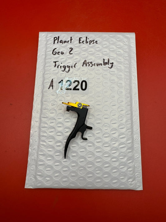 Planet Eclipse Geo 2 Trigger Assembly - used paintball trigger assembly - black/gold
