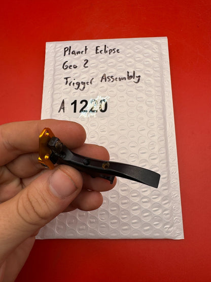 Planet Eclipse Geo 2 Trigger Assembly - used paintball trigger assembly - black/gold