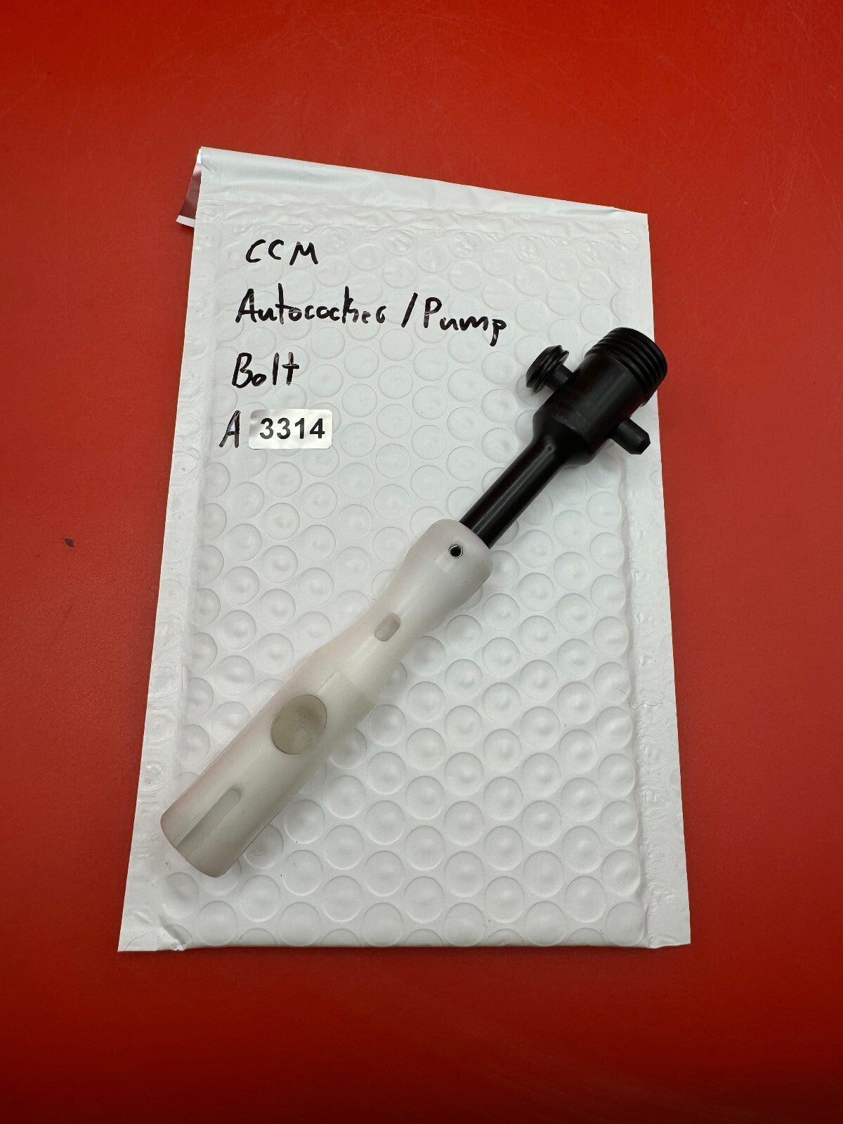 CCM Autococker / Pump Bolt - used paintball bolt - black/white