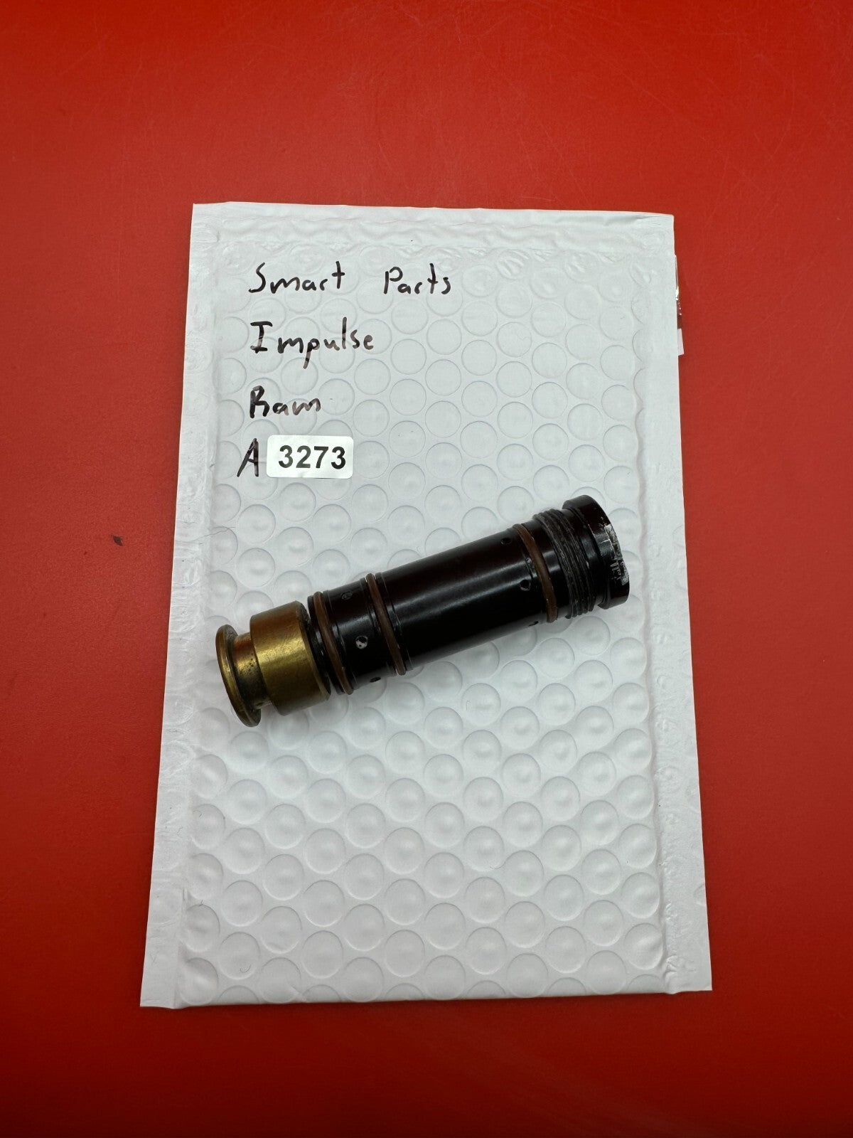 Smart Parts Impulse RAM - used paintball ram (pneumatic ram/piston) - black/brass