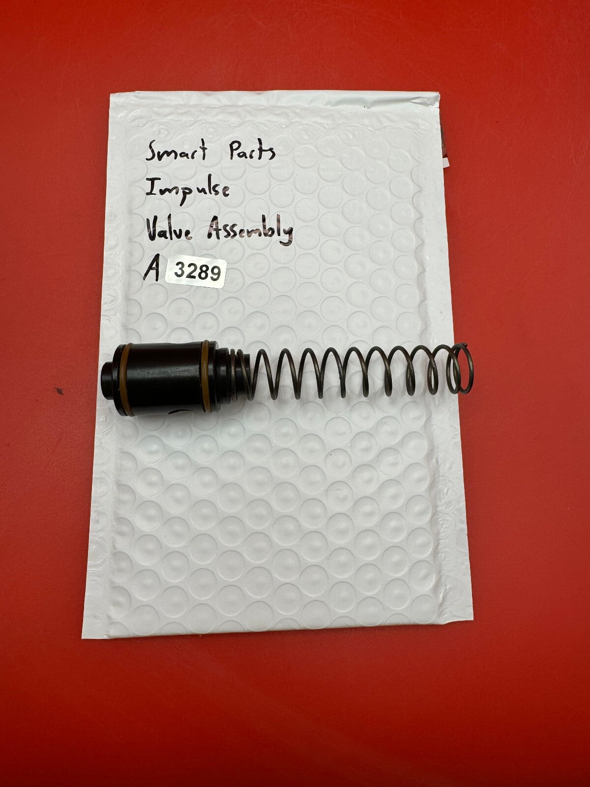 Smart Parts Impulse Valve Assembly - used paintball valve assembly - black