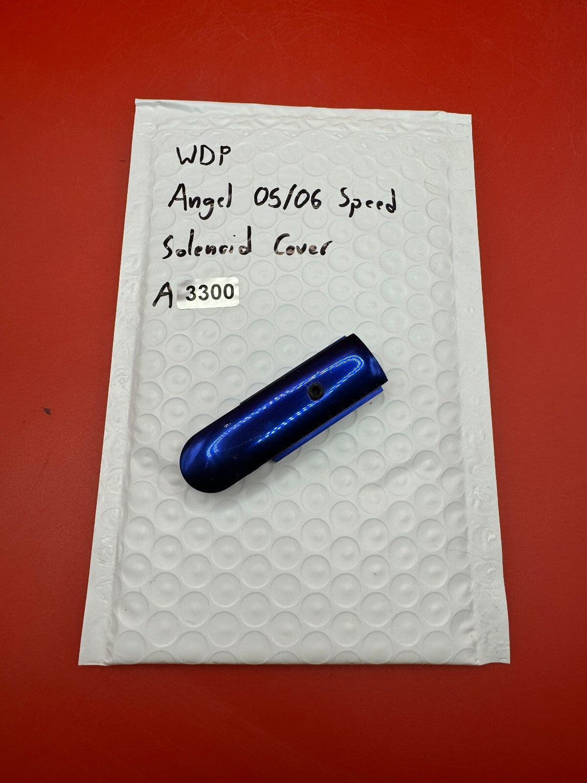 WDP Angel 05/06 Speed Solenoid Cover - used paintball solenoid cover - blue anno