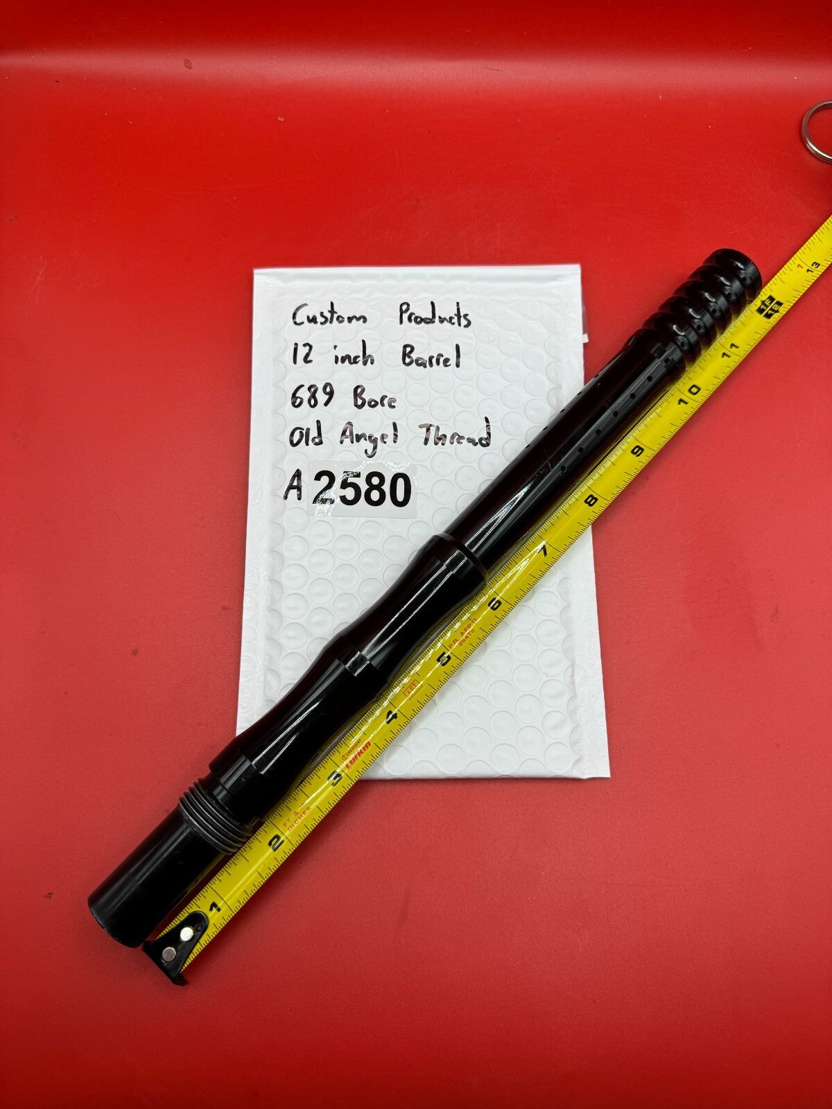 Custom Products 12 inch Paintball Barrel 689 Bore Old Angel Thread - used paintball barrel - black