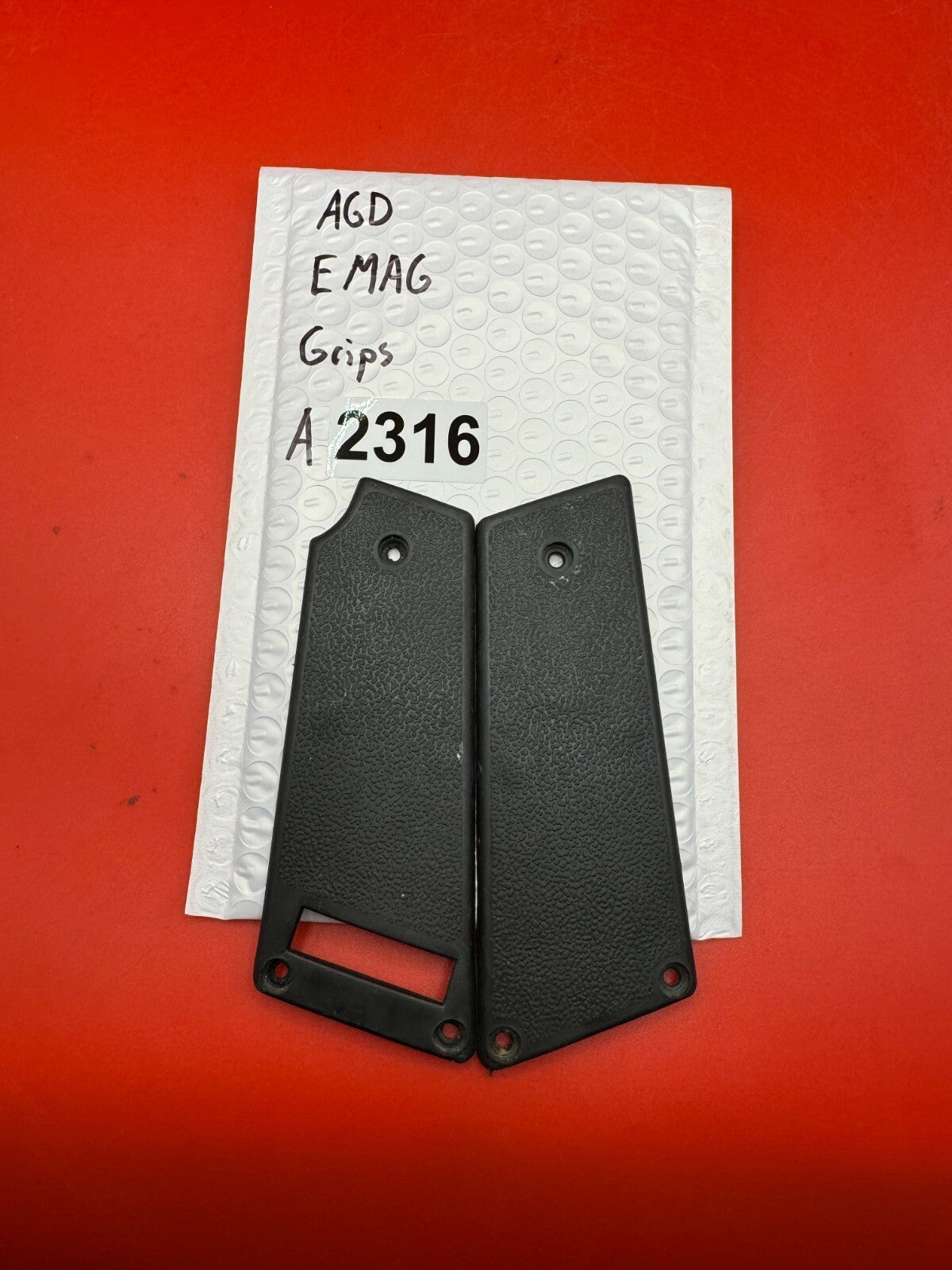 AGD E Mag Grips - used paintball grip panels - black