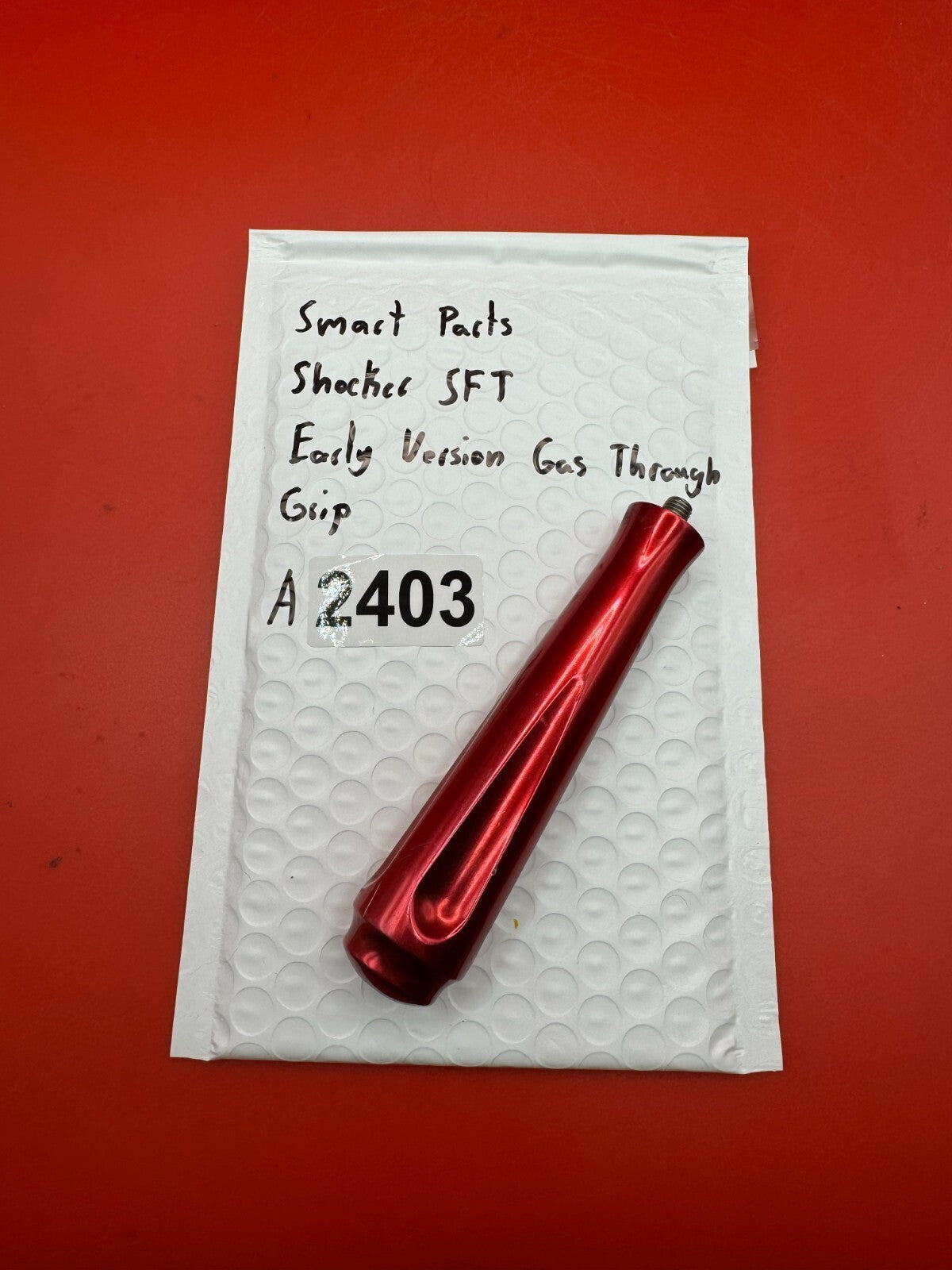 Smart Parts Shocker SFT Early Vision Gas Through Grip - used paintball gas through grip - red anno