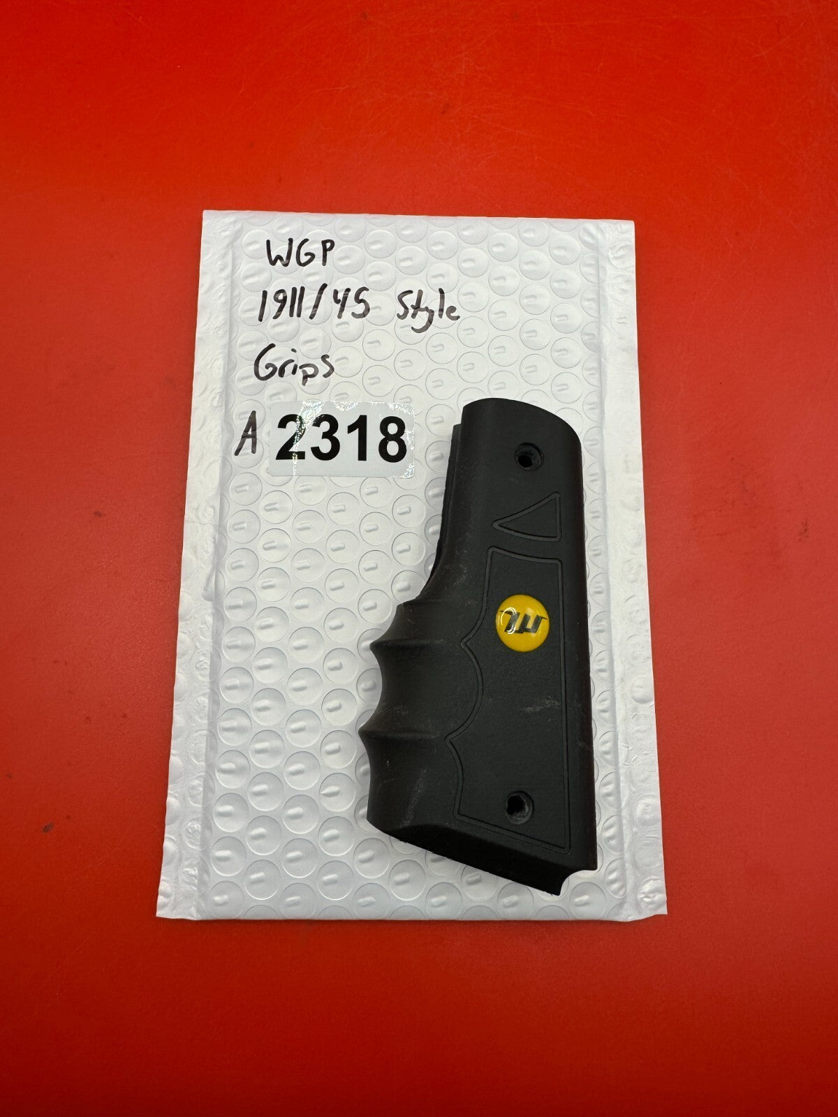 WGP 1911/45 Style Grips - used paintball grip panel - black