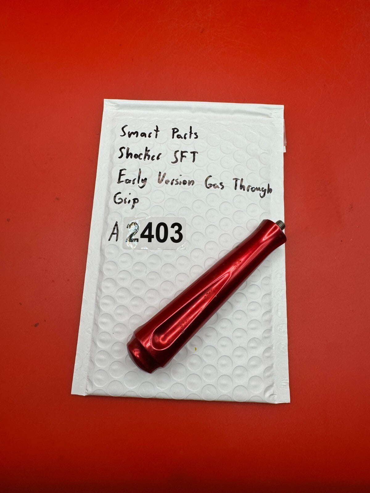 Smart Parts Shocker SFT Early Vision Gas Through Grip - used paintball gas through grip - red anno