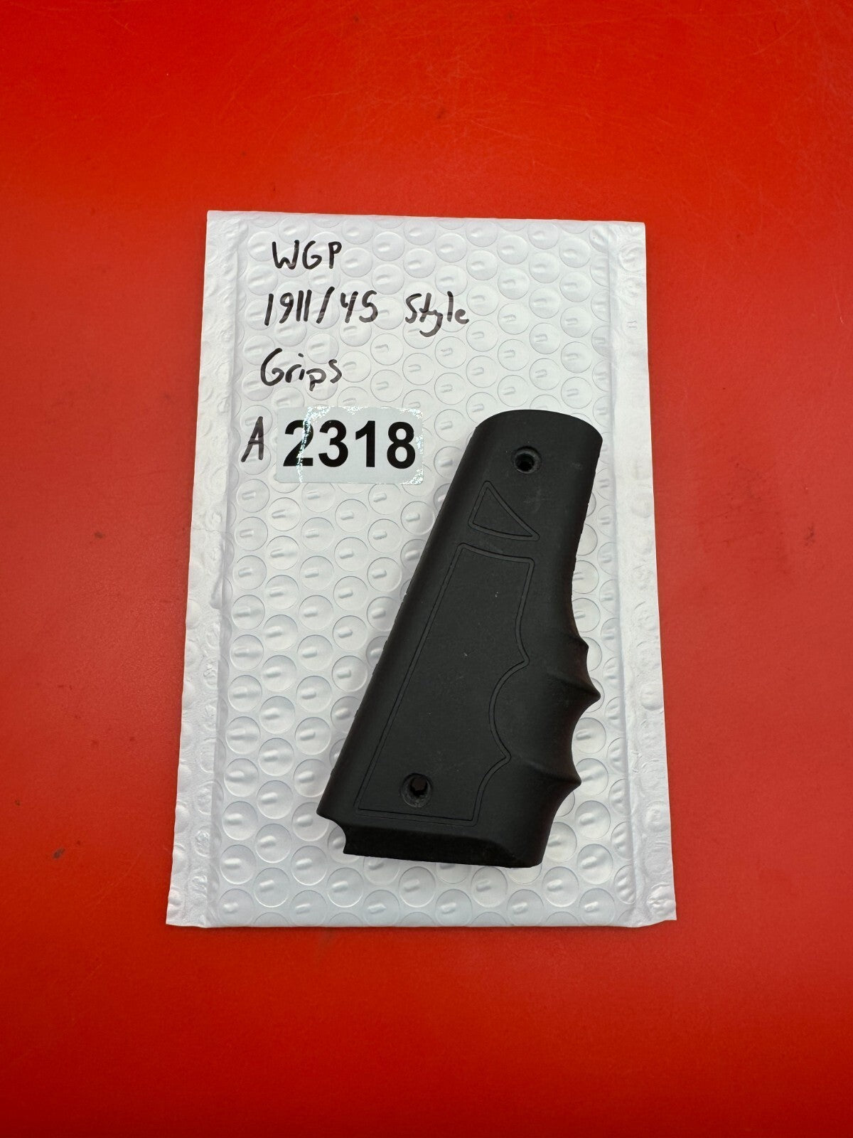 WGP 1911/45 Style Grips - used paintball grip panel - black