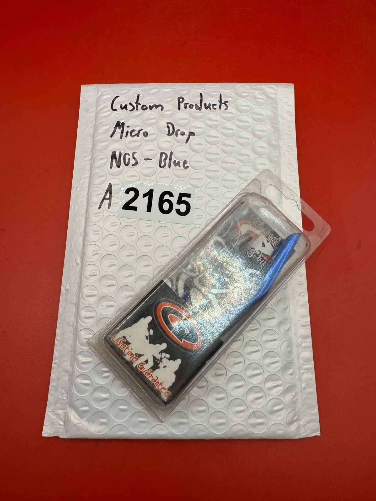 Custom Products Micro Drop NOS-Blue - used paintball drop forward - blue anno