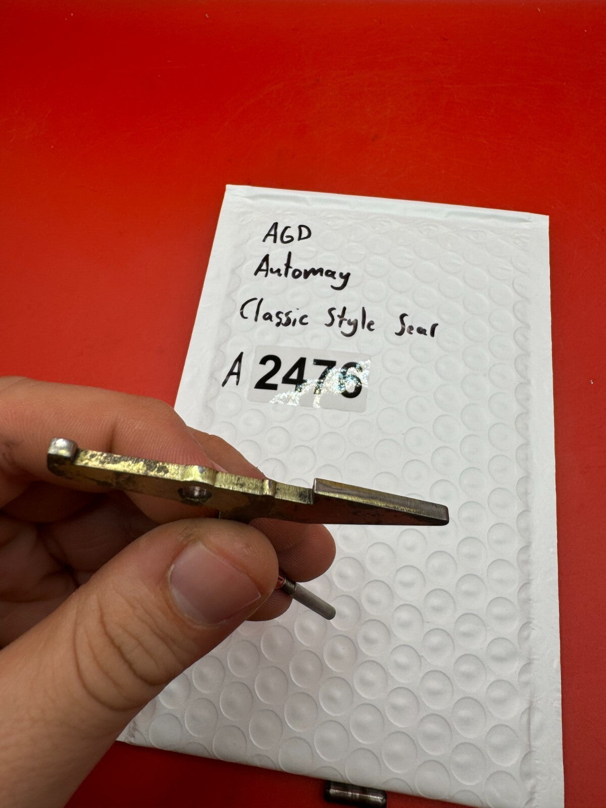 AGD Automag Classic Style Sear - used paintball sear - gold/zinc plated