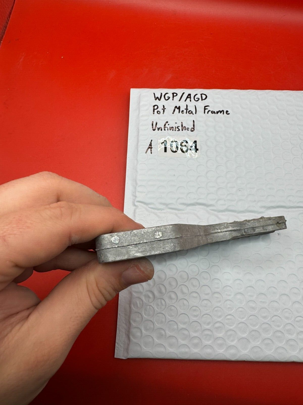 WGP/AGD Pot Metal Paintball Marker Frame Unfinished - used paintball grip frame - raw / unfinished silver
