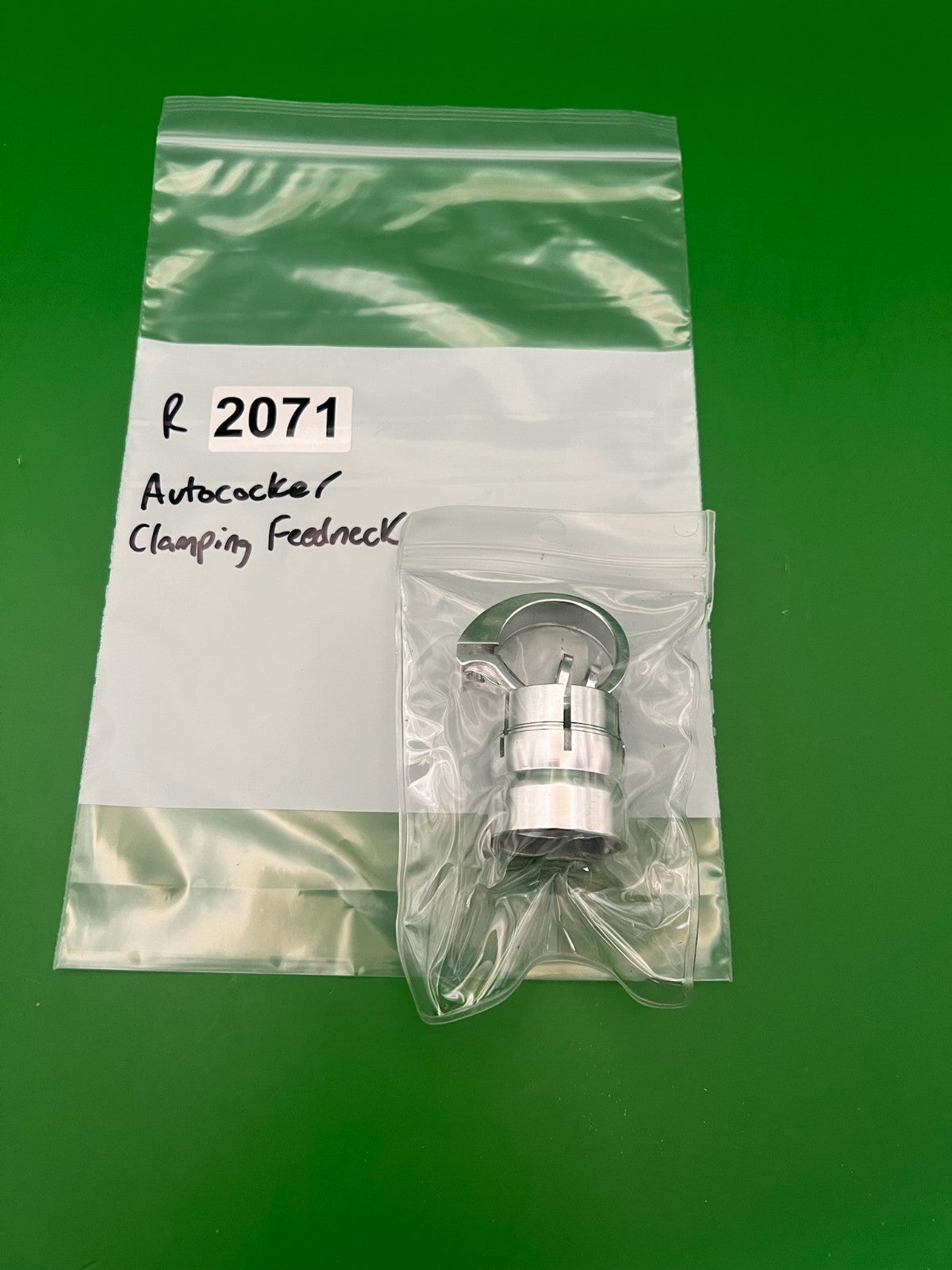 Autococker Clamping Feedneck