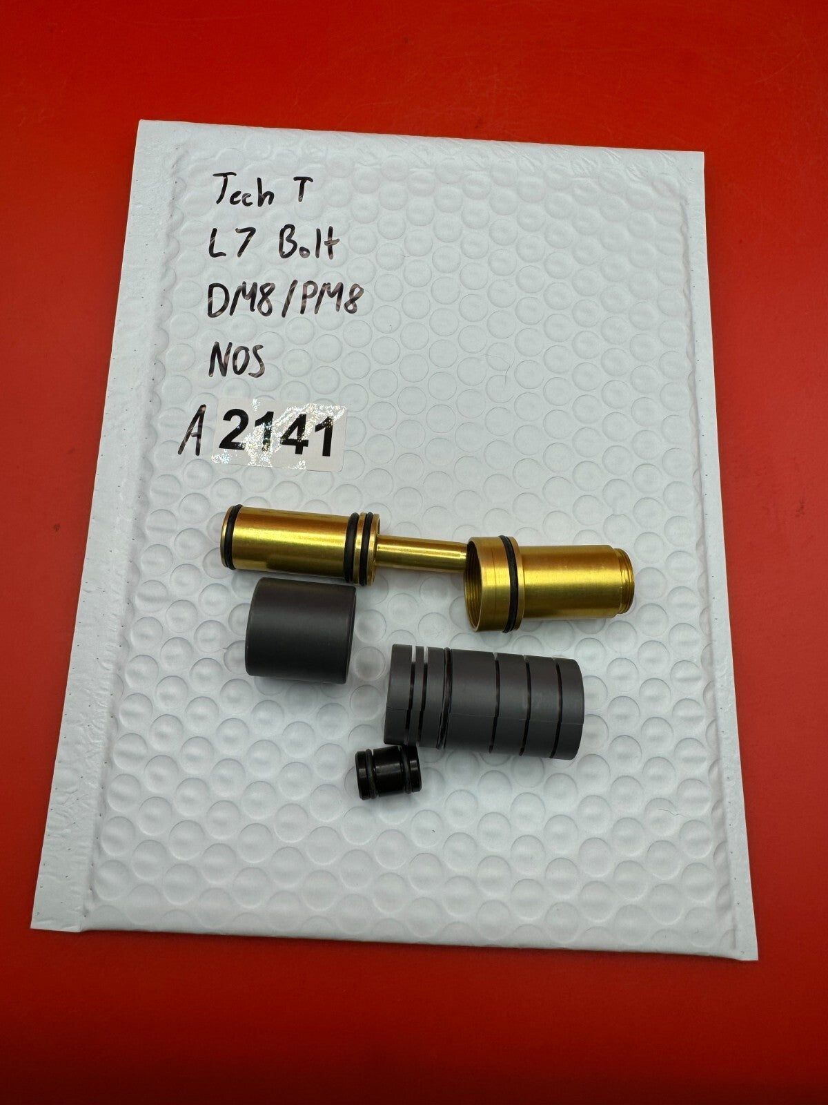 Tech T L7 Bolt DM8/PM8 NOS - used paintball bolt - gold/black