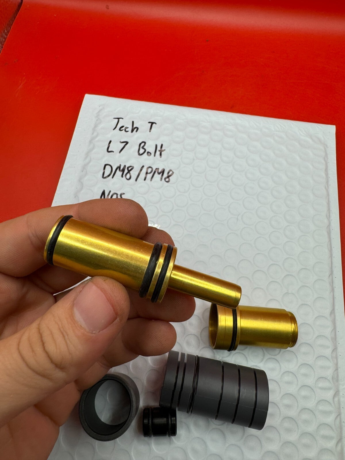 Tech T L7 Bolt DM8/PM8 NOS - used paintball bolt - gold/black