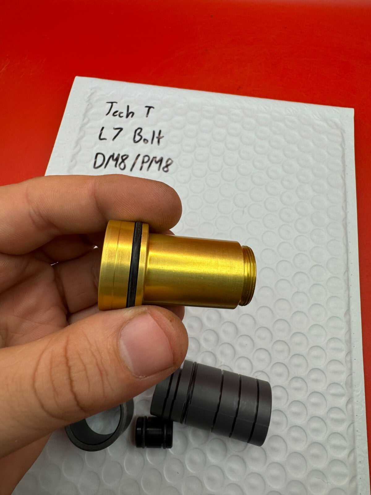 Tech T L7 Bolt DM8/PM8 NOS - used paintball bolt - gold/black