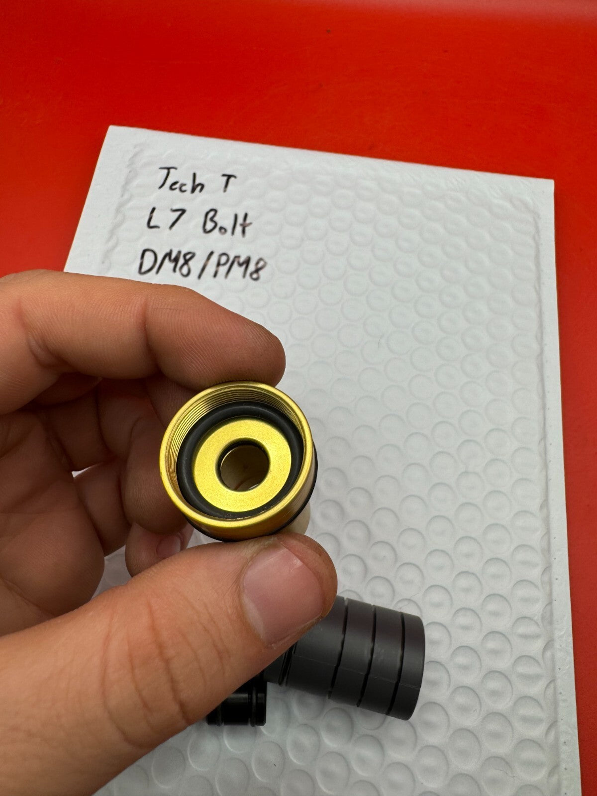 Tech T L7 Bolt DM8/PM8 NOS - used paintball bolt - gold/black