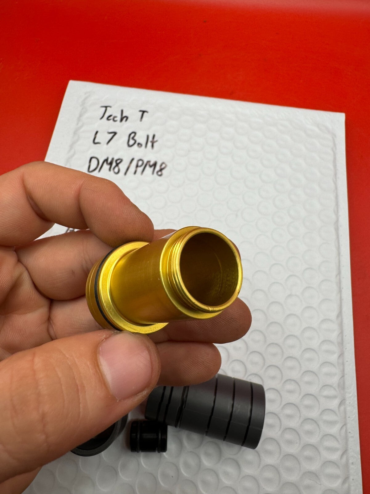 Tech T L7 Bolt DM8/PM8 NOS - used paintball bolt - gold/black