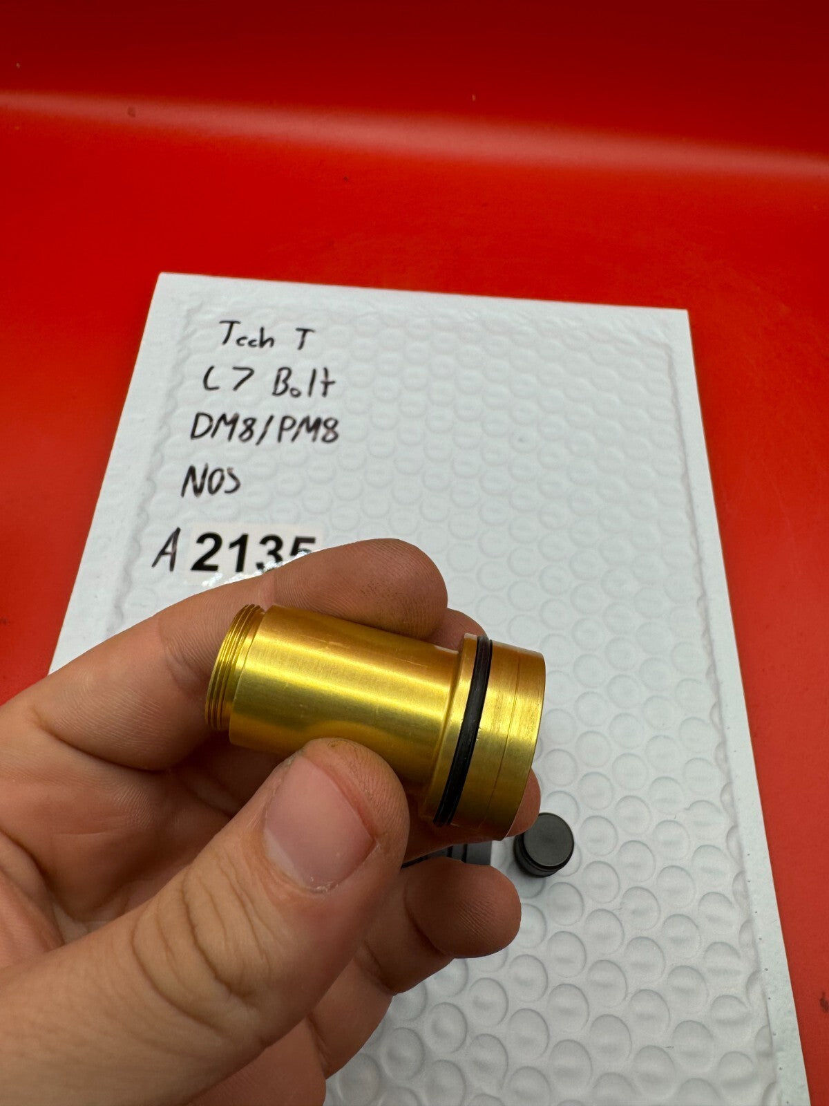 Tech T L7 Bolt DM8/PM8 NOS - used paintball bolt - gold/black